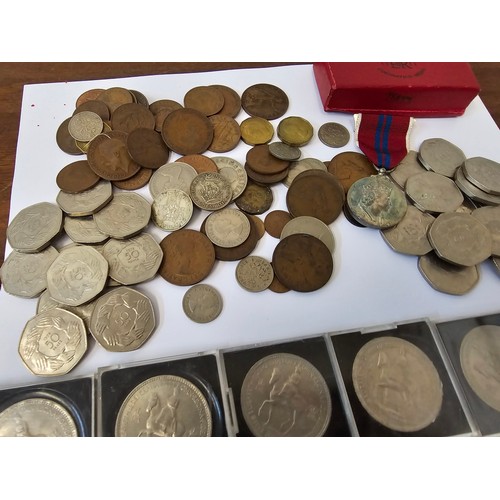 131 - A collection of British commemorative Crowns to include four 1935 Silver Jubilee Crowns and later ex... 