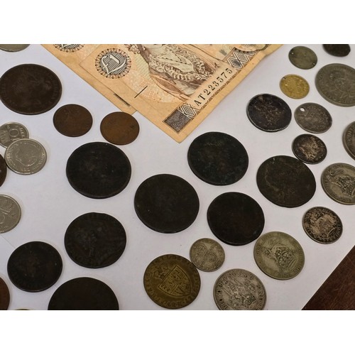 135 - World Coins - A collection of 17th Century and later coins from around the world to include England/... 