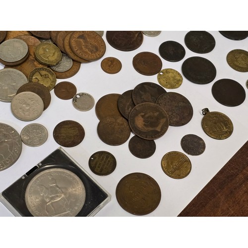 135 - World Coins - A collection of 17th Century and later coins from around the world to include England/... 