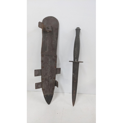 497 - A William Rogers command knife in its leather scabbard
Location:CAB
If there is no condition report ... 