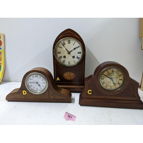 561 - Clocks to include three Edwardian mahogany cased examples with inlaid decoration
Location:10.4
If th... 