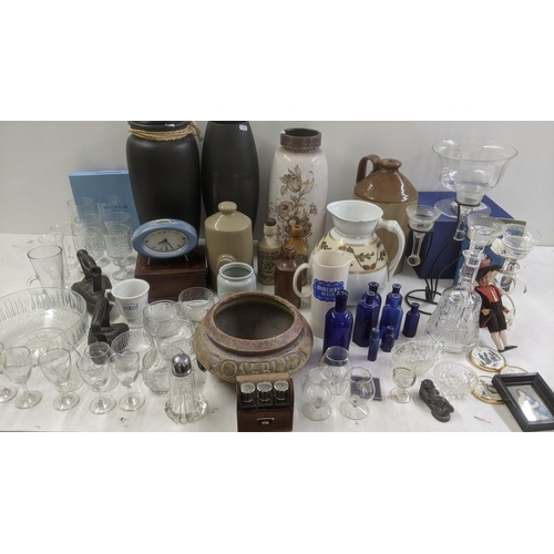 515 - A mixed lot to include stoneware bottles and flagons, crystal cut glassware, mixed pottery and other... 