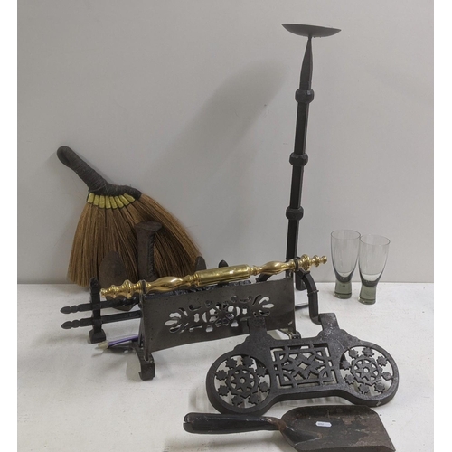 554 - Mixed metalware, mostly fine side items, along with a tall cast iron candle holder and a vintage bru... 