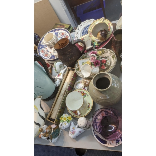 558 - A quantity of mixed ceramics to include a Doulton Lambeth pottery jug A/F, a variety of plates, teap... 