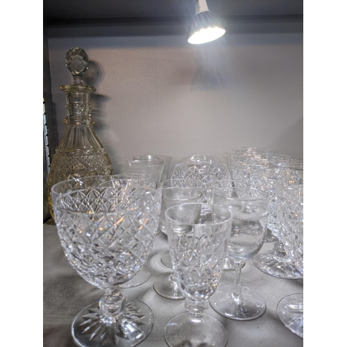 573 - Mixed cut crystal and glassware to include decanters, a crystal bowl, brandy balloons and other drin... 