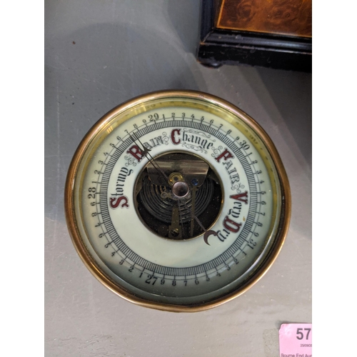 576 - Two early 20th century mantle clocks with domed tops, one faced with a Roman dial, the other with an... 