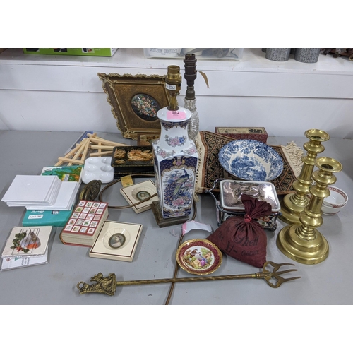 582 - A mixed lot to include two candlesticks, a Chinese style table lamp, a decorative box and games to i... 