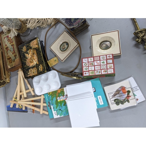 582 - A mixed lot to include two candlesticks, a Chinese style table lamp, a decorative box and games to i... 