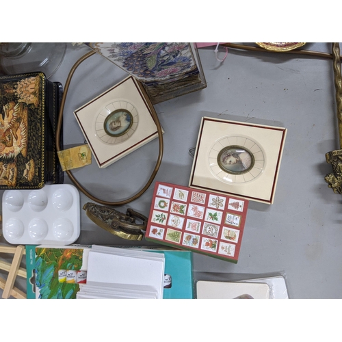 582 - A mixed lot to include two candlesticks, a Chinese style table lamp, a decorative box and games to i... 