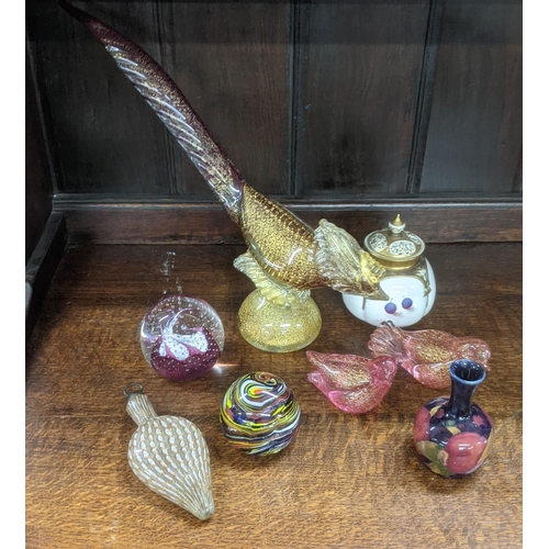 583 - A mixed lot to include a Moorcroft vase, a Venetian glass bird and others, together with a Royal Wor... 