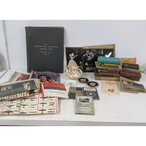 588 - A mixed lot to include Ford related handbooks and house hold books, magazines The Architectural Asso... 