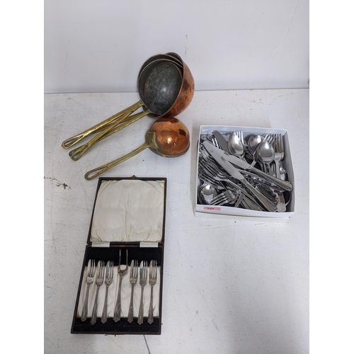 540 - A group of five graduated copper and brass ladles with tinned interiors, cased set of silver plated ... 