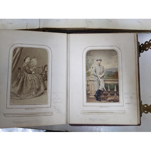 601 - A selection of seven Victorian and later photograph albums containing an extensive collection of Car... 