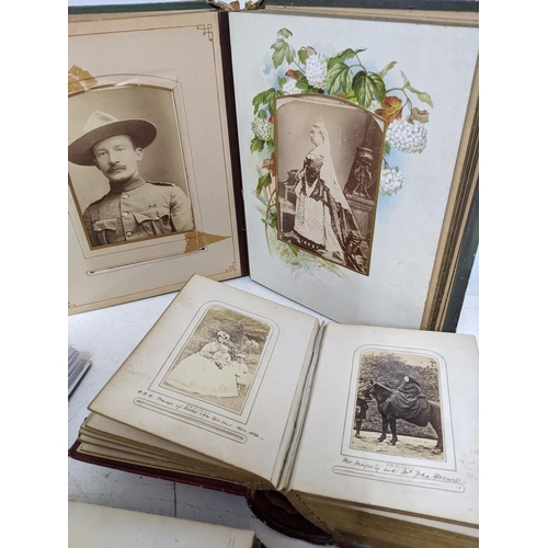 601 - A selection of seven Victorian and later photograph albums containing an extensive collection of Car... 