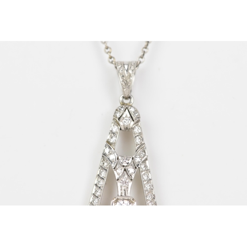 102 - An Art Deco white gold pendant and a 14ct white gold belcher necklace, the pendant set with a centra... 