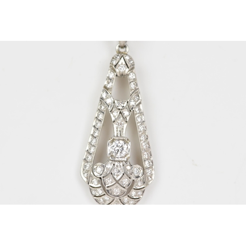 102 - An Art Deco white gold pendant and a 14ct white gold belcher necklace, the pendant set with a centra... 