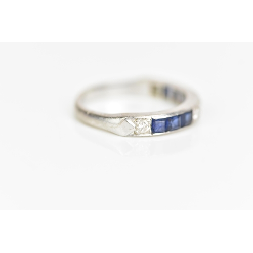 106 - An 18ct white gold half eternity, set with six square cut sapphires and five brilliant cut diamonds,... 