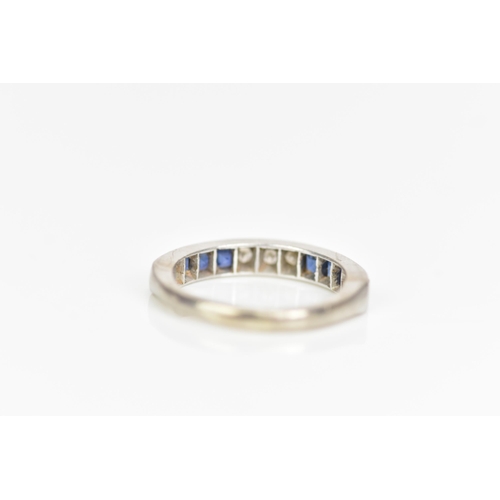 106 - An 18ct white gold half eternity, set with six square cut sapphires and five brilliant cut diamonds,... 