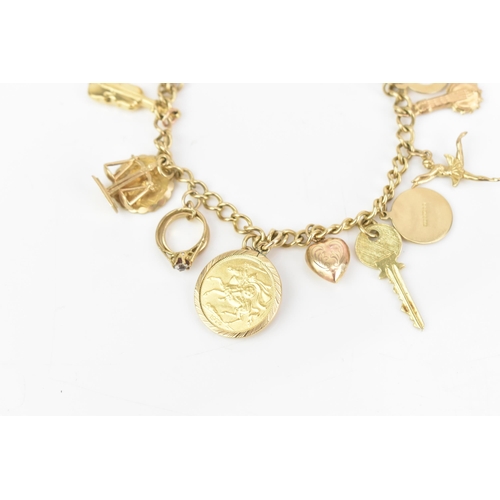 108 - A 9ct yellow gold curb link charm bracelet, with various 9ct gold charms including a thimble, teapot... 