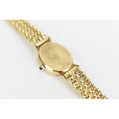 109 - A Bulova, quartz, ladies, 14ct yellow gold wristwatch, the white dial having gilt baton markers, sur... 