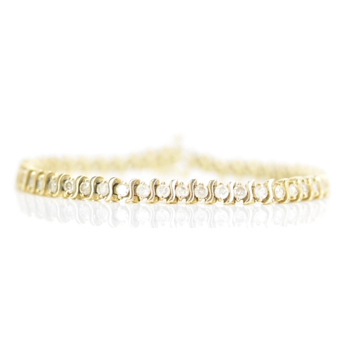 110 - A 14ct gold diamond tennis bracelet, with forty-six diamonds in claw settings, stamped 14K, each sto... 