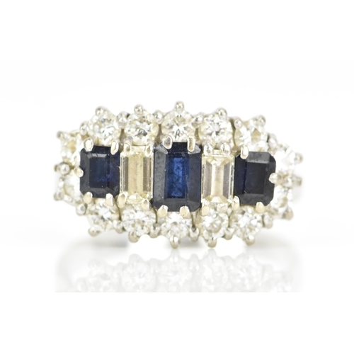 114 - An 18ct white gold sapphire and diamond dress ring, having three baguette cut sapphires and two bagu... 