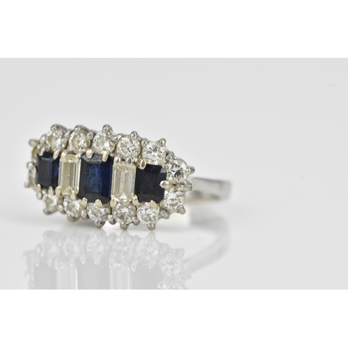 114 - An 18ct white gold sapphire and diamond dress ring, having three baguette cut sapphires and two bagu... 