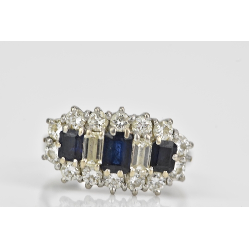 114 - An 18ct white gold sapphire and diamond dress ring, having three baguette cut sapphires and two bagu... 