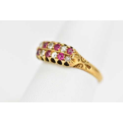 115 - A Victorian 18ct gold diamond and ruby ring, the twelve alternating stones inset into two rows and h... 