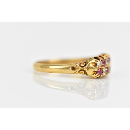 115 - A Victorian 18ct gold diamond and ruby ring, the twelve alternating stones inset into two rows and h... 