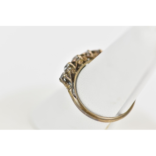 118 - A late Victorian/Edwardian five stone diamond ring, the brilliant cut diamonds in claw settings, lar... 