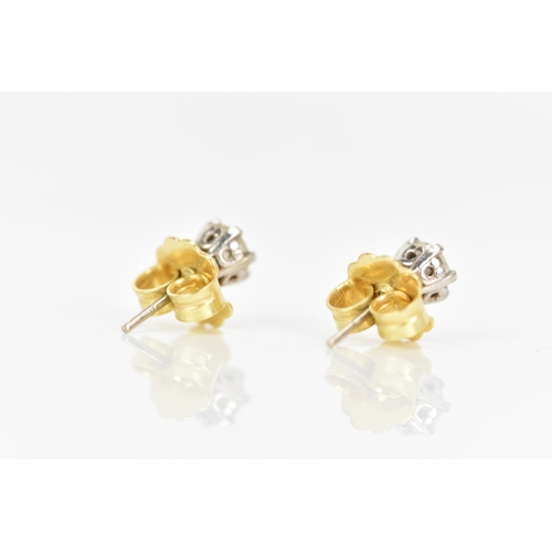 125 - A pair of 18ct yellow and white gold diamond earrings, each brilliant cut diamond 4.7mm, approx colo... 