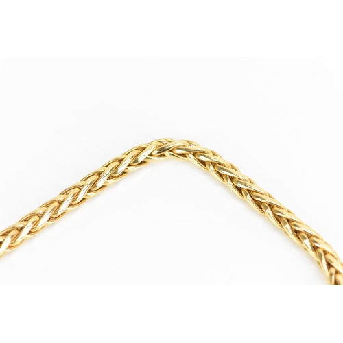 126 - A 9ct yellow gold wheat chain link necklace, having a bolt ring clasp and with four blue sapphire ca... 