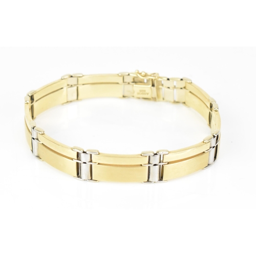 142 - A 14ct bi-coloured gold bracelet, having an open box clasp and stamped ASSOS 585, 22.2cm, 26.8 grams... 