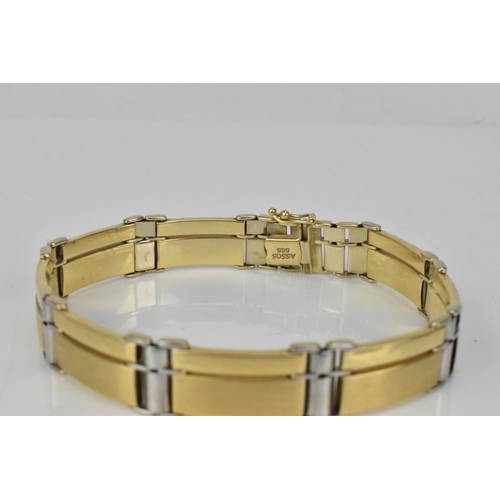 142 - A 14ct bi-coloured gold bracelet, having an open box clasp and stamped ASSOS 585, 22.2cm, 26.8 grams... 