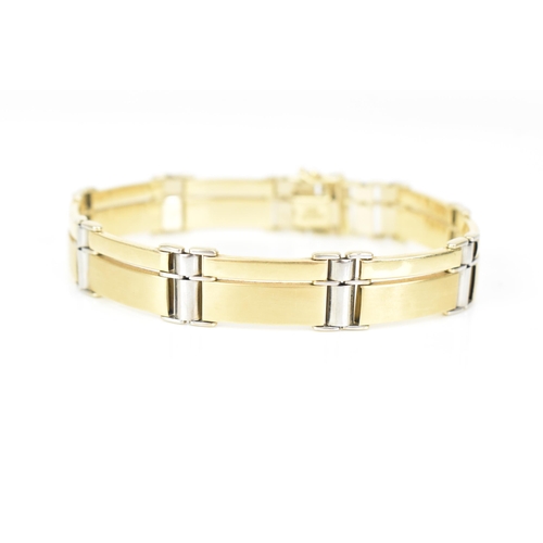 142 - A 14ct bi-coloured gold bracelet, having an open box clasp and stamped ASSOS 585, 22.2cm, 26.8 grams... 