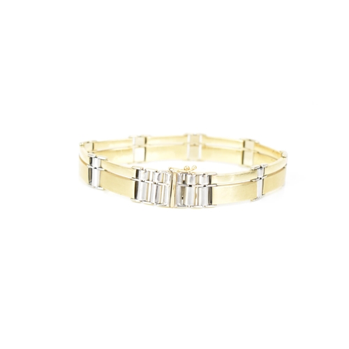 142 - A 14ct bi-coloured gold bracelet, having an open box clasp and stamped ASSOS 585, 22.2cm, 26.8 grams... 