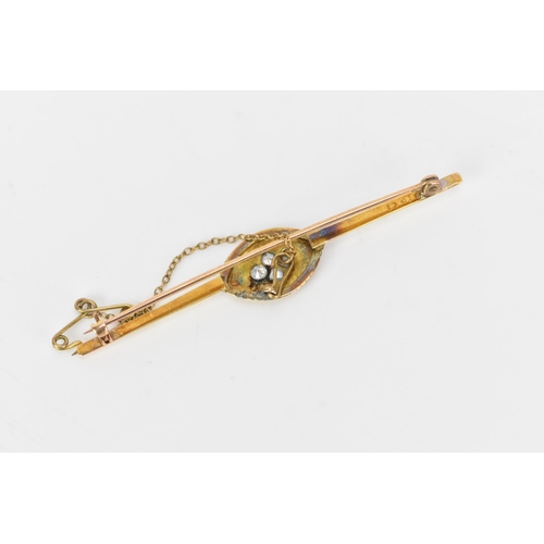 152 - A Victorian yellow metal bar brooch, having four old cut diamonds to the centre creating a floral de... 