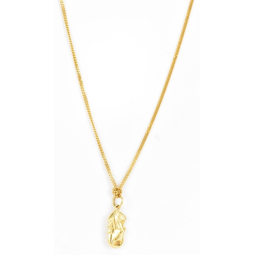 162 - An 18ct yellow gold necklace with two 22ct gold pendants, the curb chain link necklace having a bolt... 