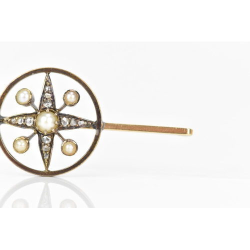 163 - A Victorian 15ct gold brooch, the centre in a star configuration, inset with five pearls, the larges... 