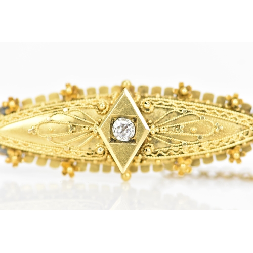 164 - A Victorian 15ct yellow gold pin brooch, having a central old cut diamond, 2.5mm, in a claw setting ... 