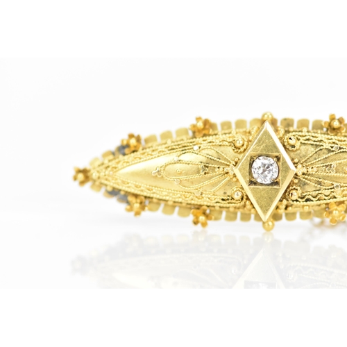 164 - A Victorian 15ct yellow gold pin brooch, having a central old cut diamond, 2.5mm, in a claw setting ... 