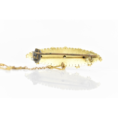 164 - A Victorian 15ct yellow gold pin brooch, having a central old cut diamond, 2.5mm, in a claw setting ... 