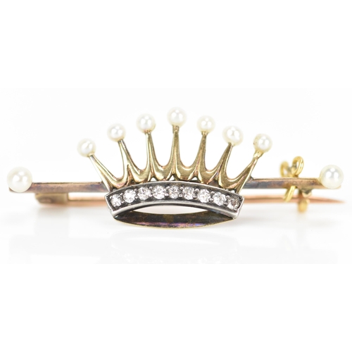 165 - A Victorian yellow metal pearl and diamond coronet/crown brooch, the crown inset with a band of nine... 