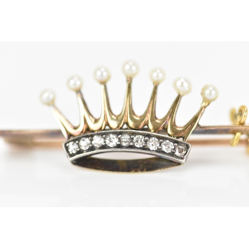 165 - A Victorian yellow metal pearl and diamond coronet/crown brooch, the crown inset with a band of nine... 