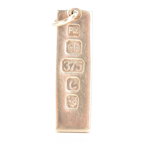 168 - A 9ct gold bar pendant, by Pobjoy Mint Ltd, hallmarked London 1977, 42.9mm high excluding suspension... 