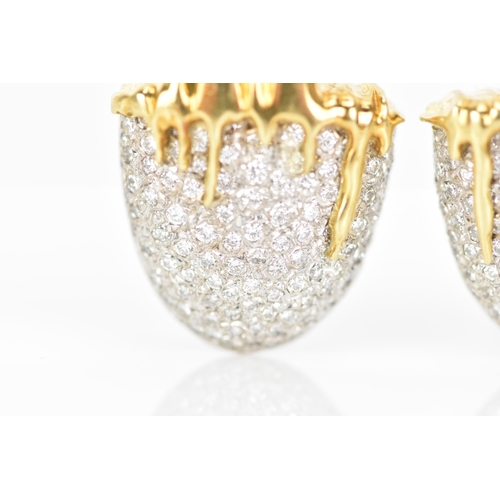 173 - A pair of 18ct yellow and white gold diamond pave set earrings, each fashioned as acorns with drop d... 