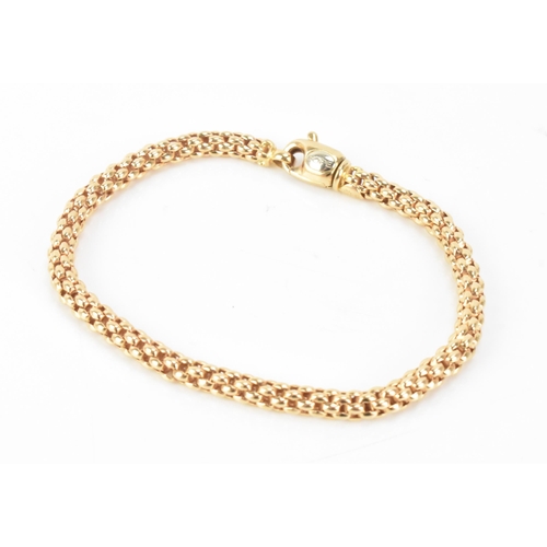 175 - An 18ct yellow gold spegia link bracelet, the lobster claw clasp stamped FOPE 750, 19cm, 10.7 grams
... 