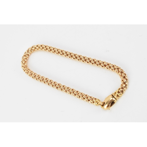 175 - An 18ct yellow gold spegia link bracelet, the lobster claw clasp stamped FOPE 750, 19cm, 10.7 grams
... 