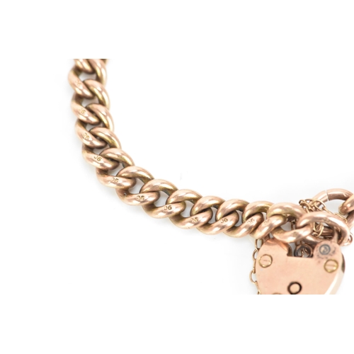 179 - A 9ct rose gold curb link bracelet, having a heart shaped padlock clasp, stamped 9ct, 19.2 grams
If ... 